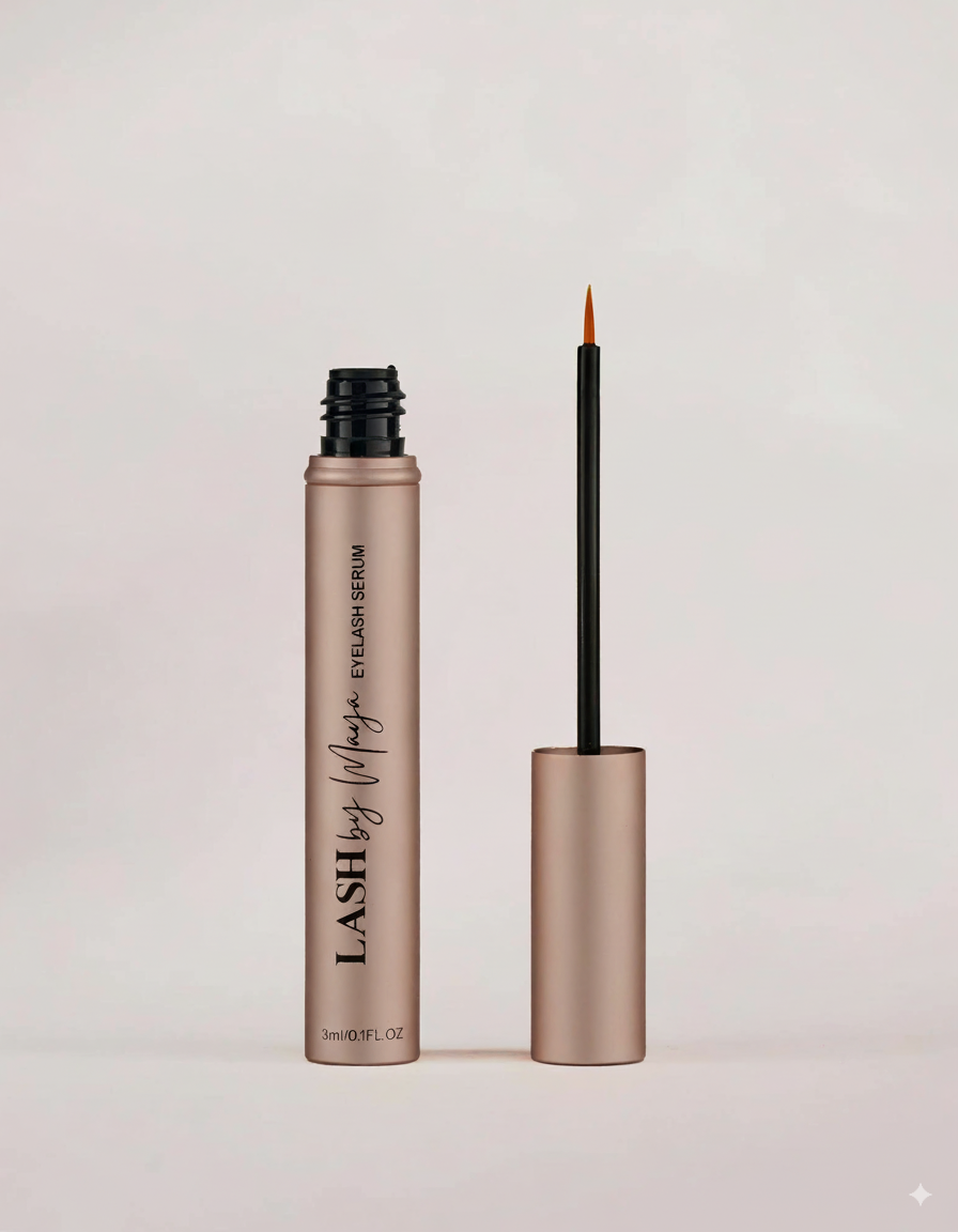 Eyelash serum with applicator on a light gray background